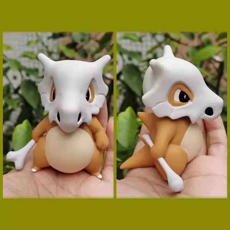Cubone Pokémon figure hand-held chibi statue with bone club and skull helmet anime collectible