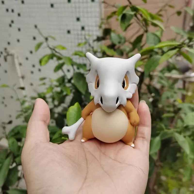 Cubone Hand-Held Figure | Pokémon Chibi Statue with Bone Club | Desktop Anime Collectible | Geekzillaa