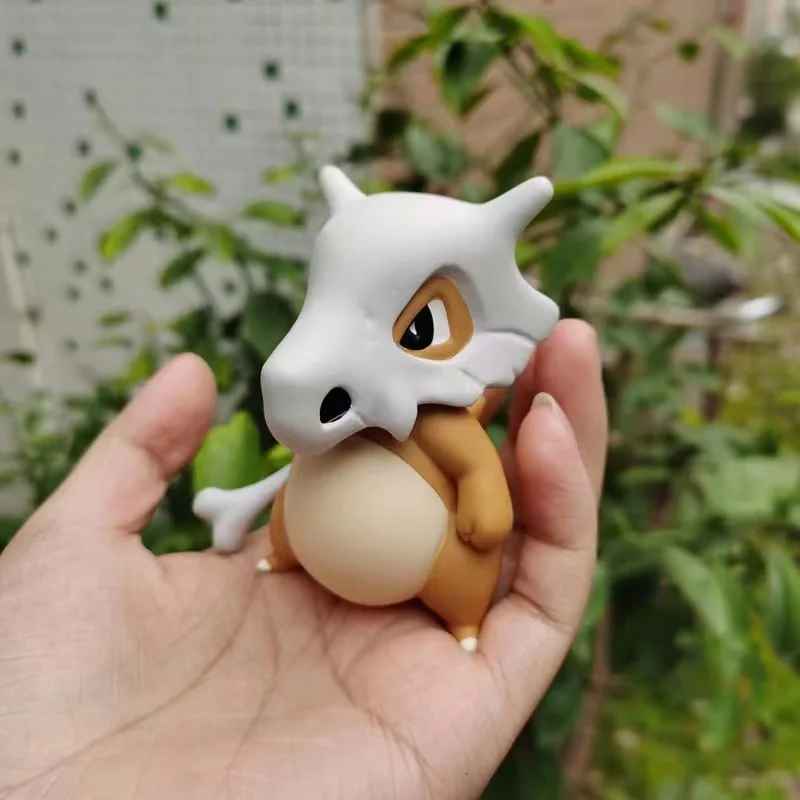 Cubone Hand-Held Figure | Pokémon Chibi Statue with Bone Club | Desktop Anime Collectible | Geekzillaa