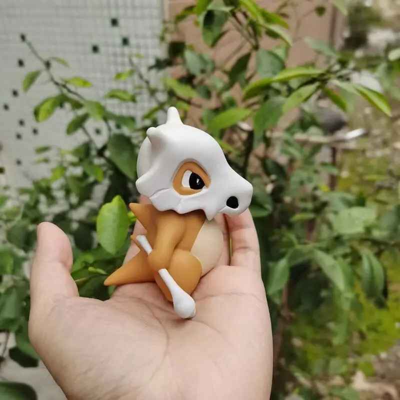 Cubone Hand-Held Figure | Pokémon Chibi Statue with Bone Club | Desktop Anime Collectible | Geekzillaa