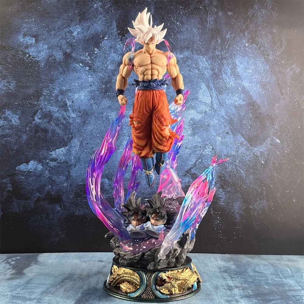 Goku Ultra Instinct figure with silver hair and purple energy aura base dragon ball super statue