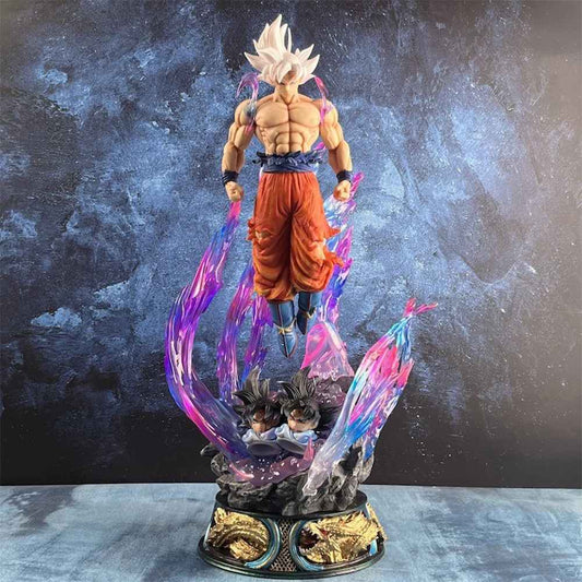 Goku Ultra Instinct figure with silver hair and purple energy aura base dragon ball super statue